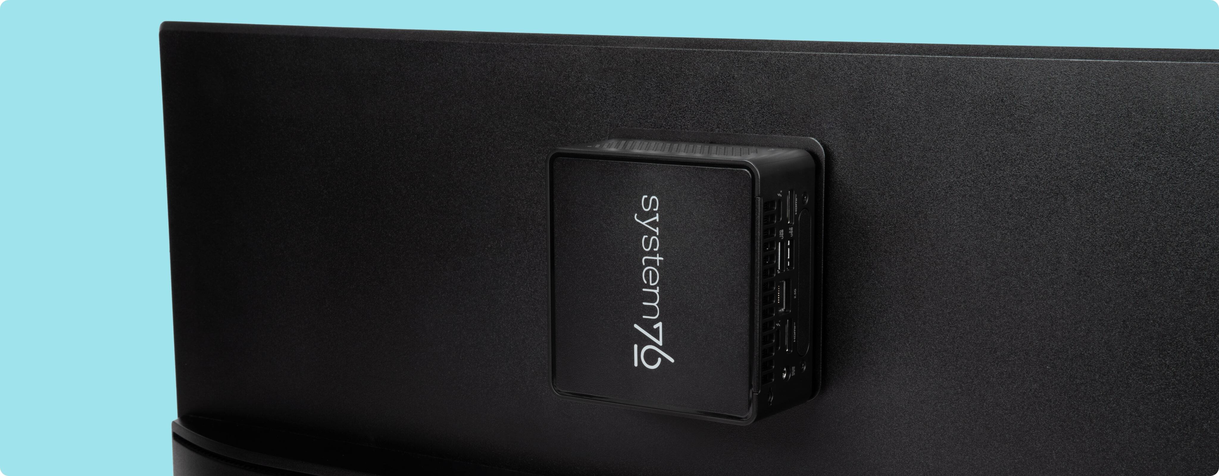 meerkat mounted on a vesa mount on the back of a display monitor