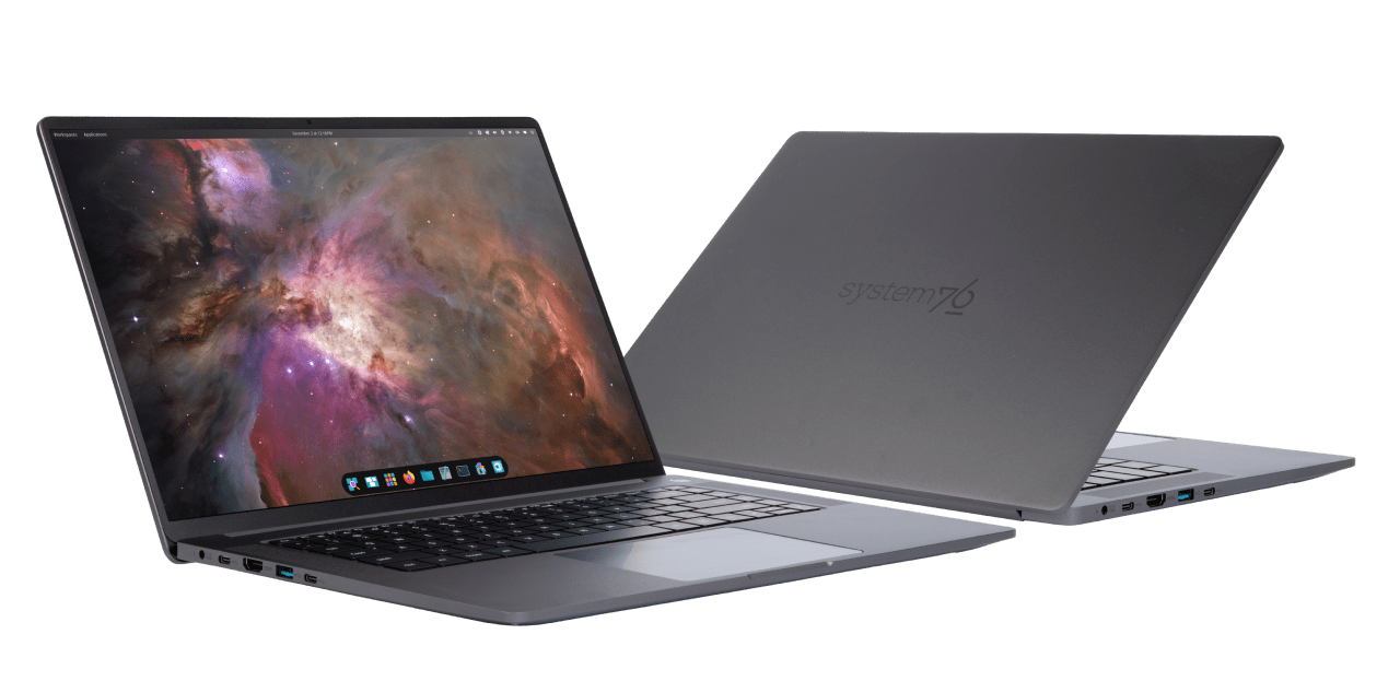 These two Pangolin laptops are striking a pose. The first is fully open and rocking a space-themed Pop!_OS wallpaper; the other, looking sleek in dark gray, is open halfway, back to camera. Quite the dynamic duo!