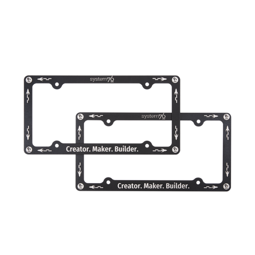 System76 License plate frames that feature the system76 rocket, pop!_os logo and Creator.Maker. Builder. slogan proudly.