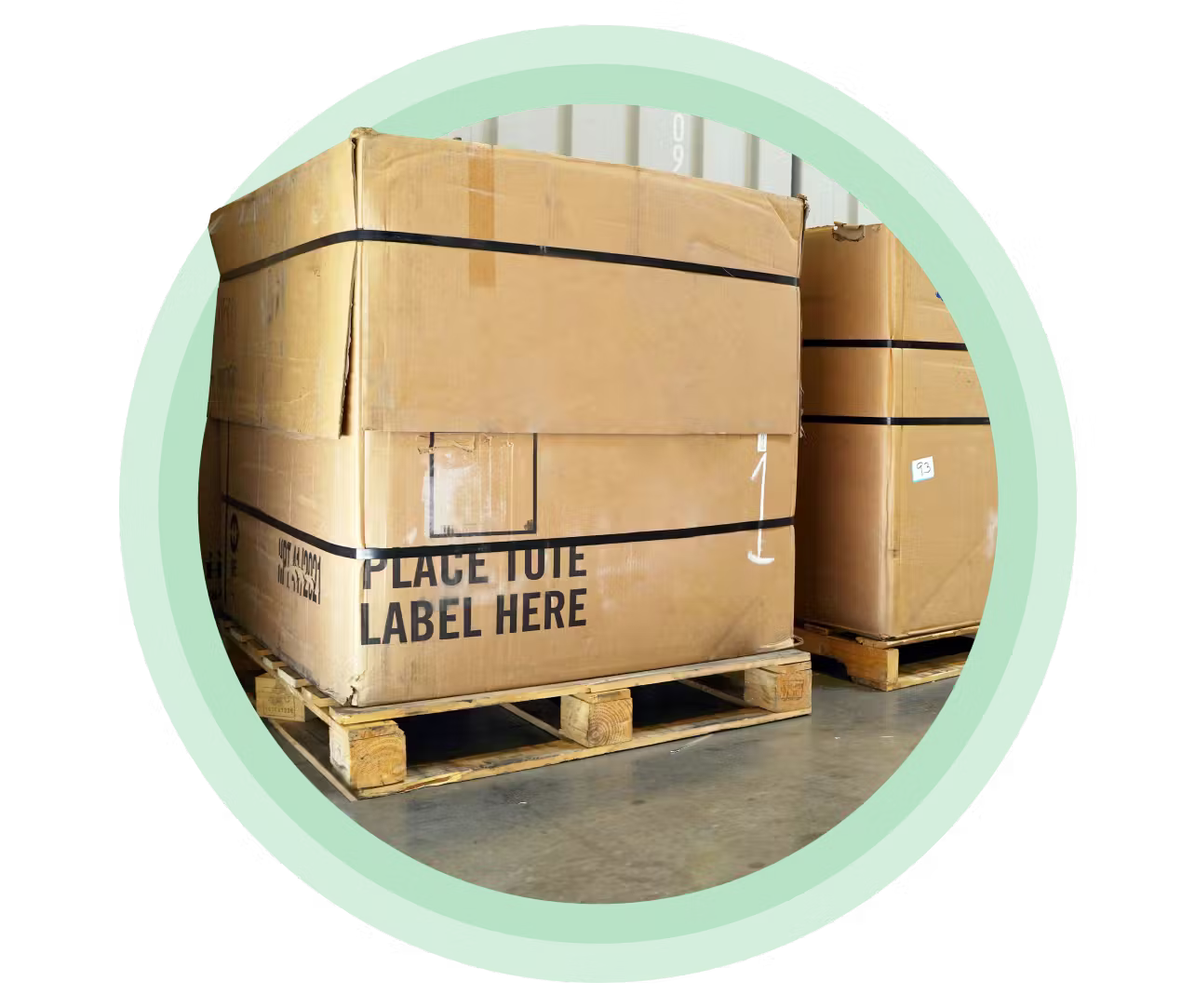 Cardboard boxes used for recycling at the System76 factory on top of pallets.